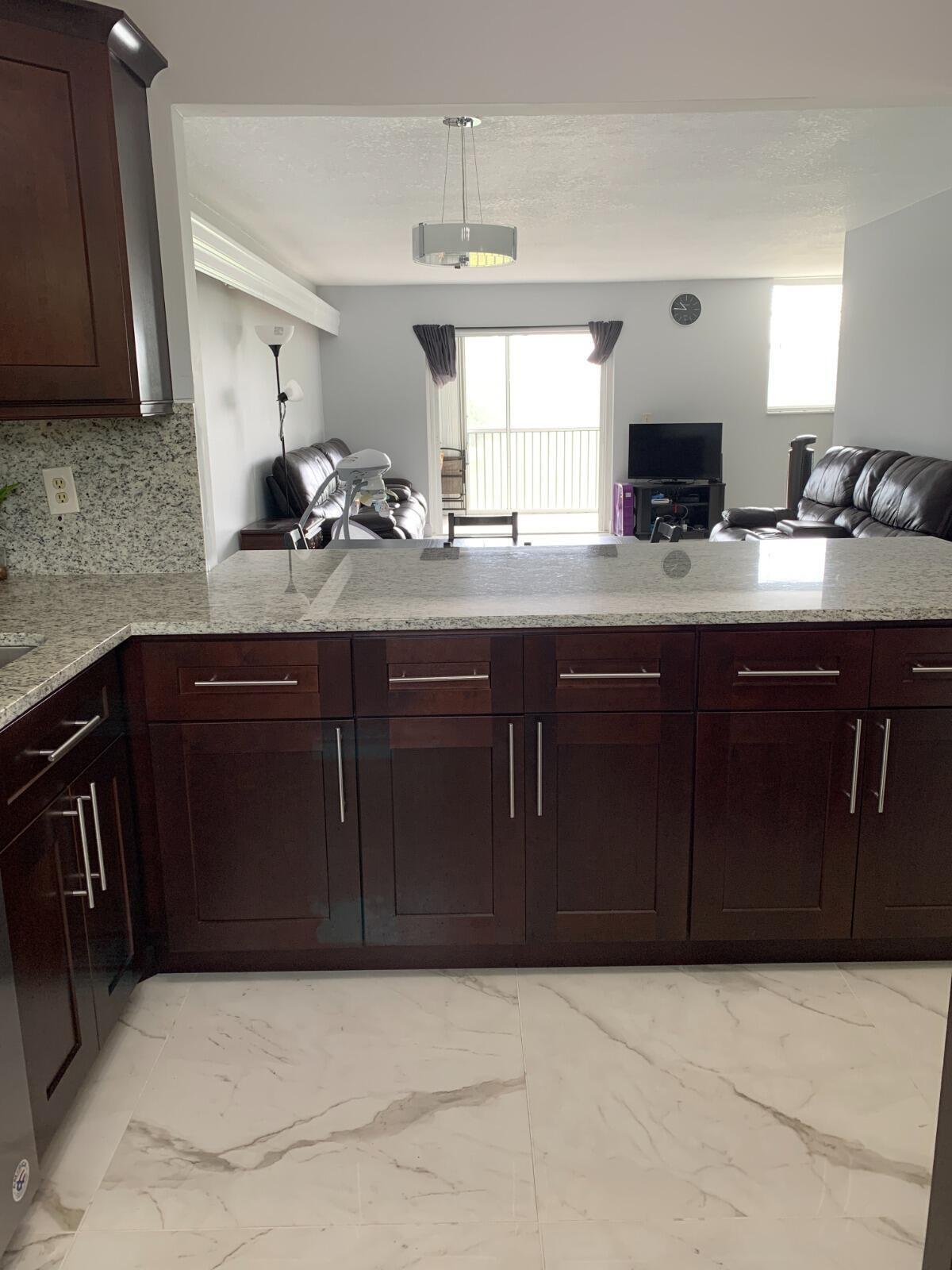 5700 Northwest 2nd Avenue, Unit 311 Boca Raton, FL 33487 - Photo 2 of 12 5700 311 kithchen 2