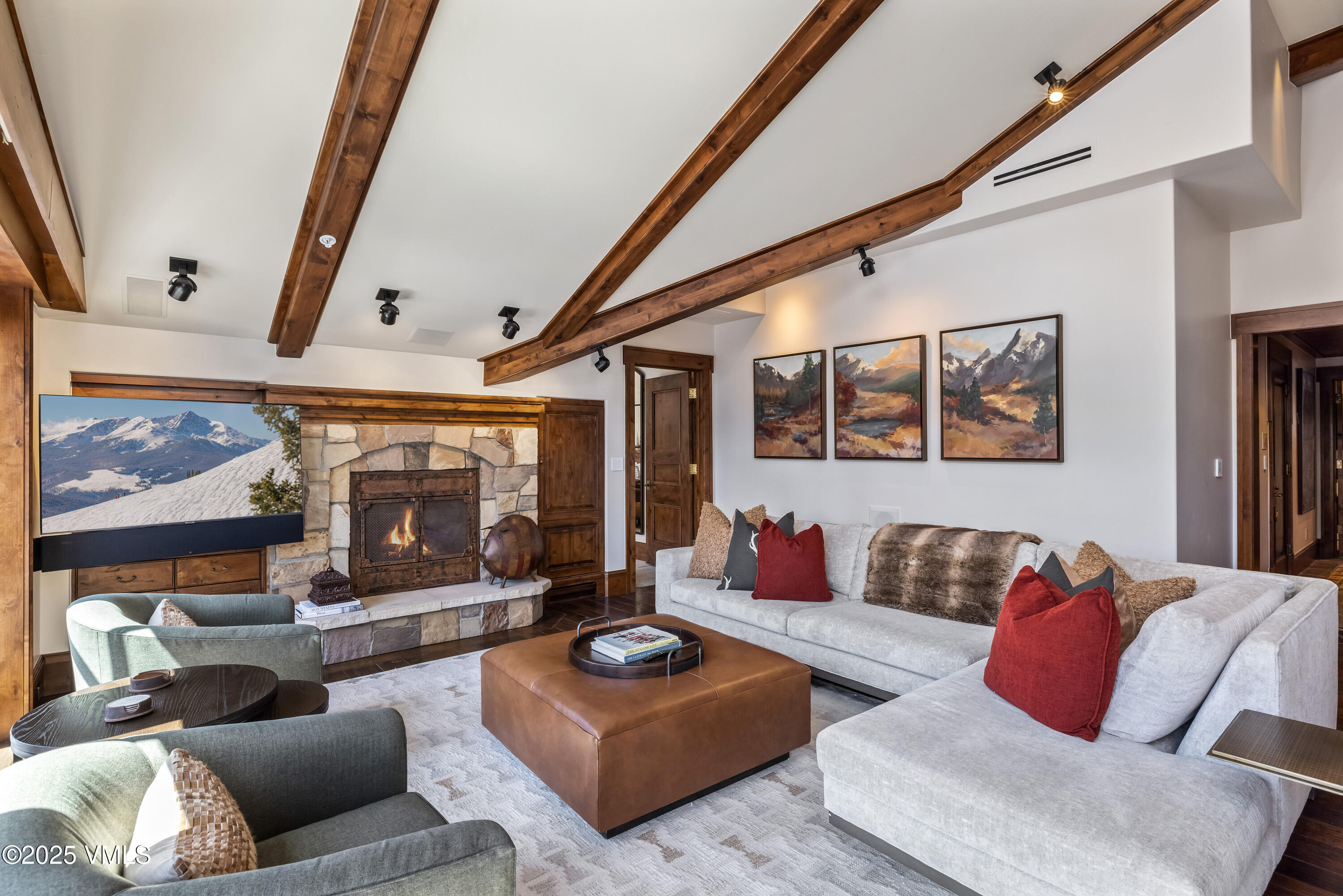 1 Willow Bridge Road, Unit 42 Vail, CO 81657 - Photo 17 of 72 a living room with furniture and a fireplace