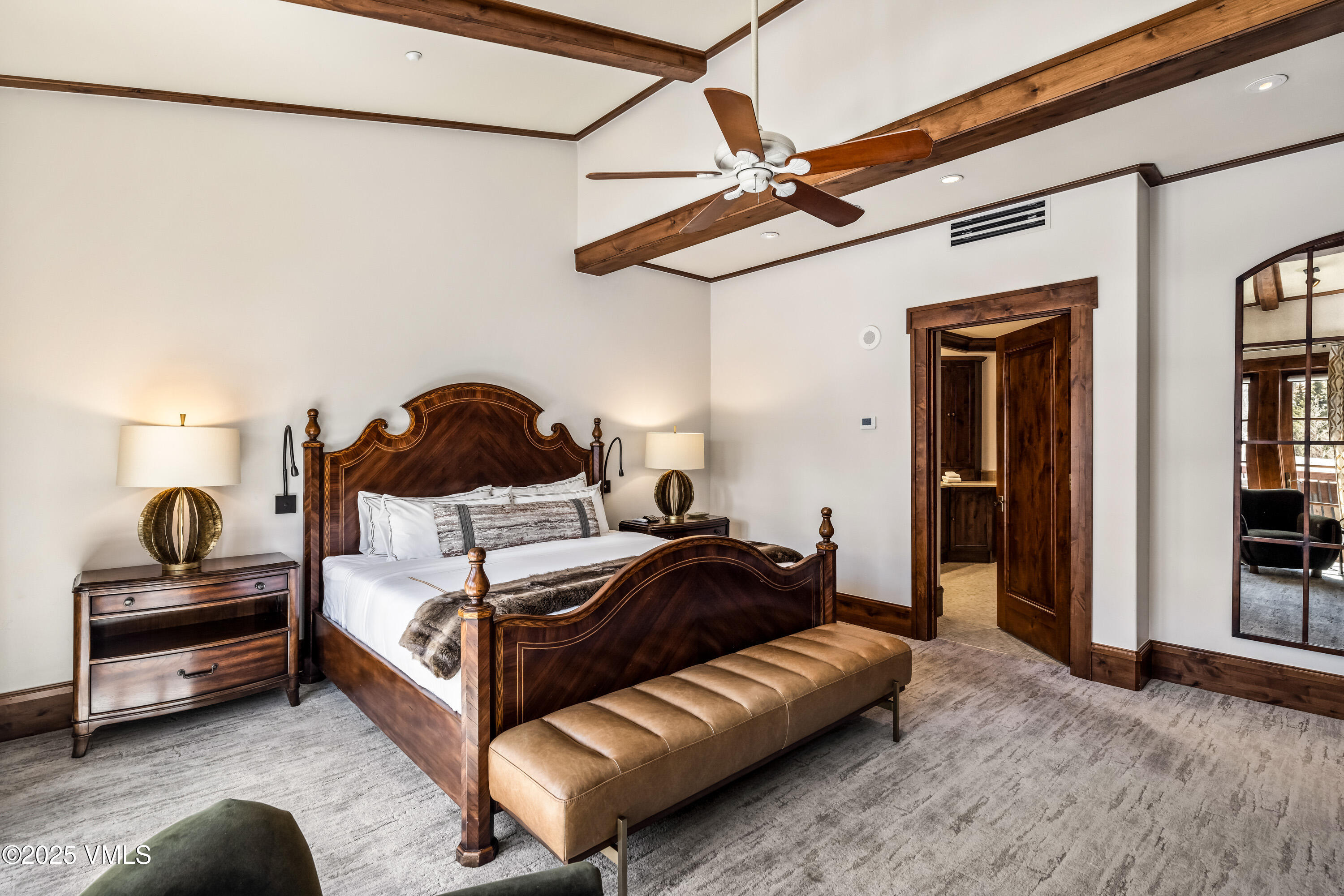 1 Willow Bridge Road, Unit 42 Vail, CO 81657 - Photo 30 of 72 a bedroom with a bed window and a ceiling fan