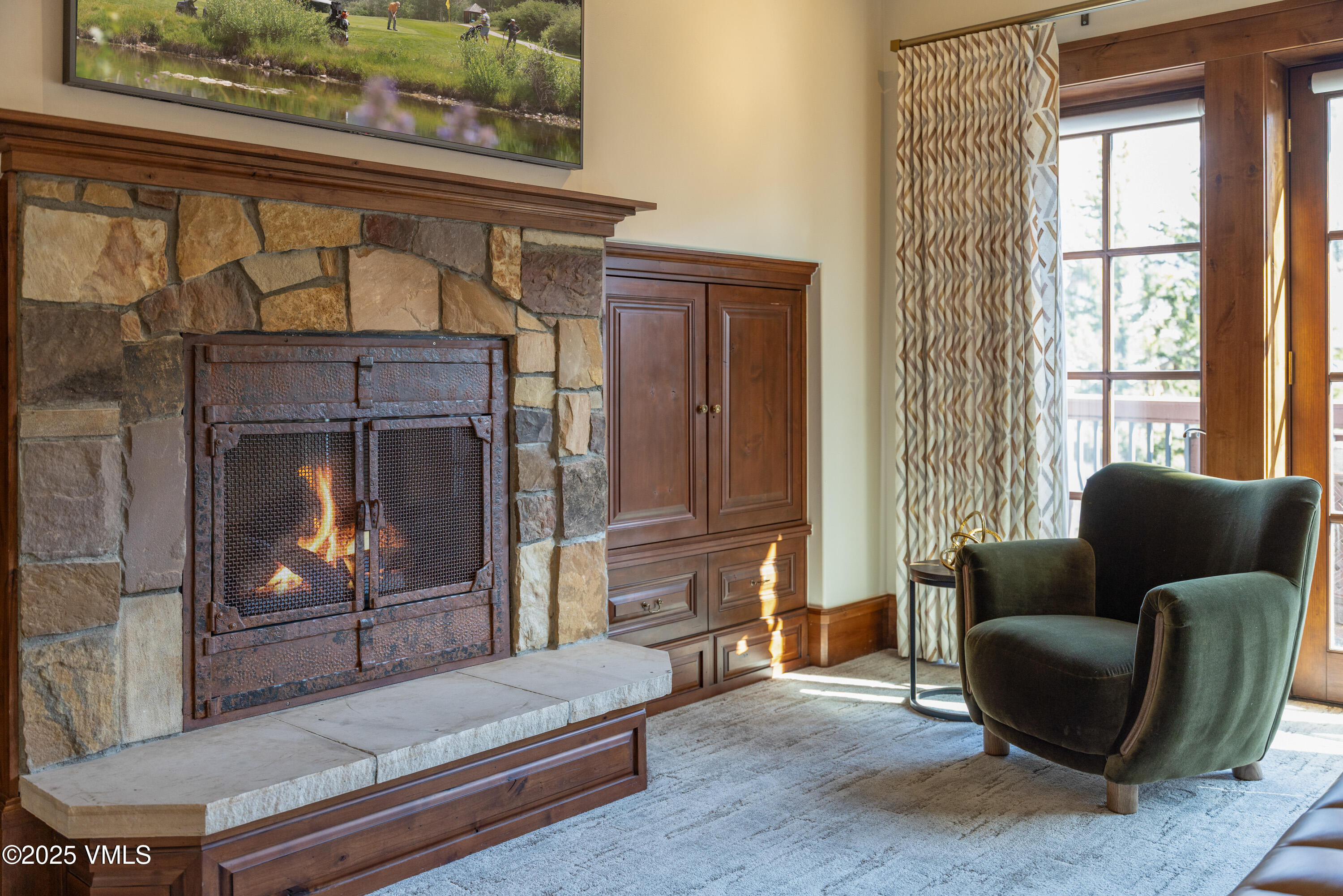 1 Willow Bridge Road, Unit 42 Vail, CO 81657 - Photo 33 of 72 primary bedroom fireplace