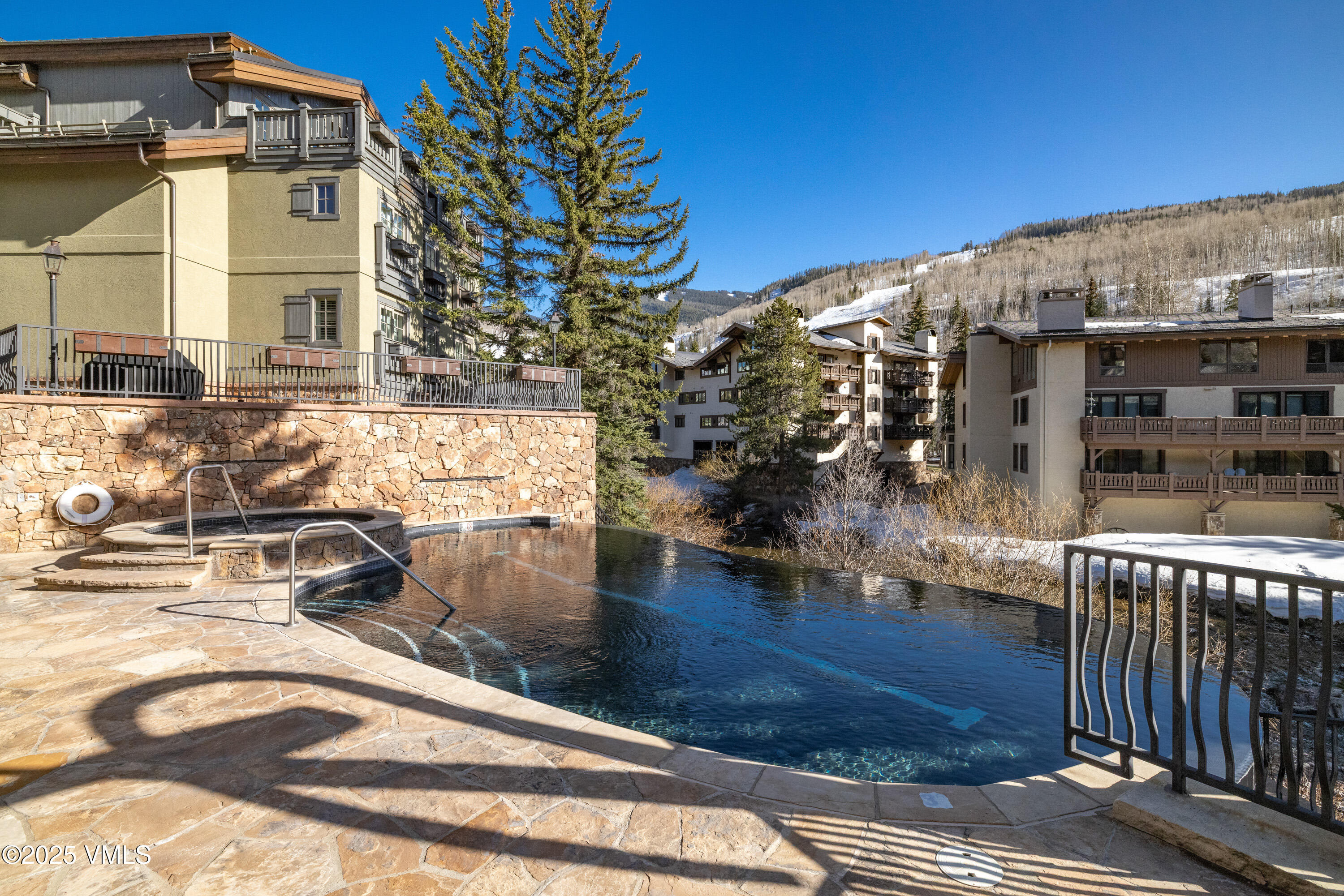 1 Willow Bridge Road, Unit 42 Vail, CO 81657 - Photo 54 of 72 a view of a balcony with swimming pool