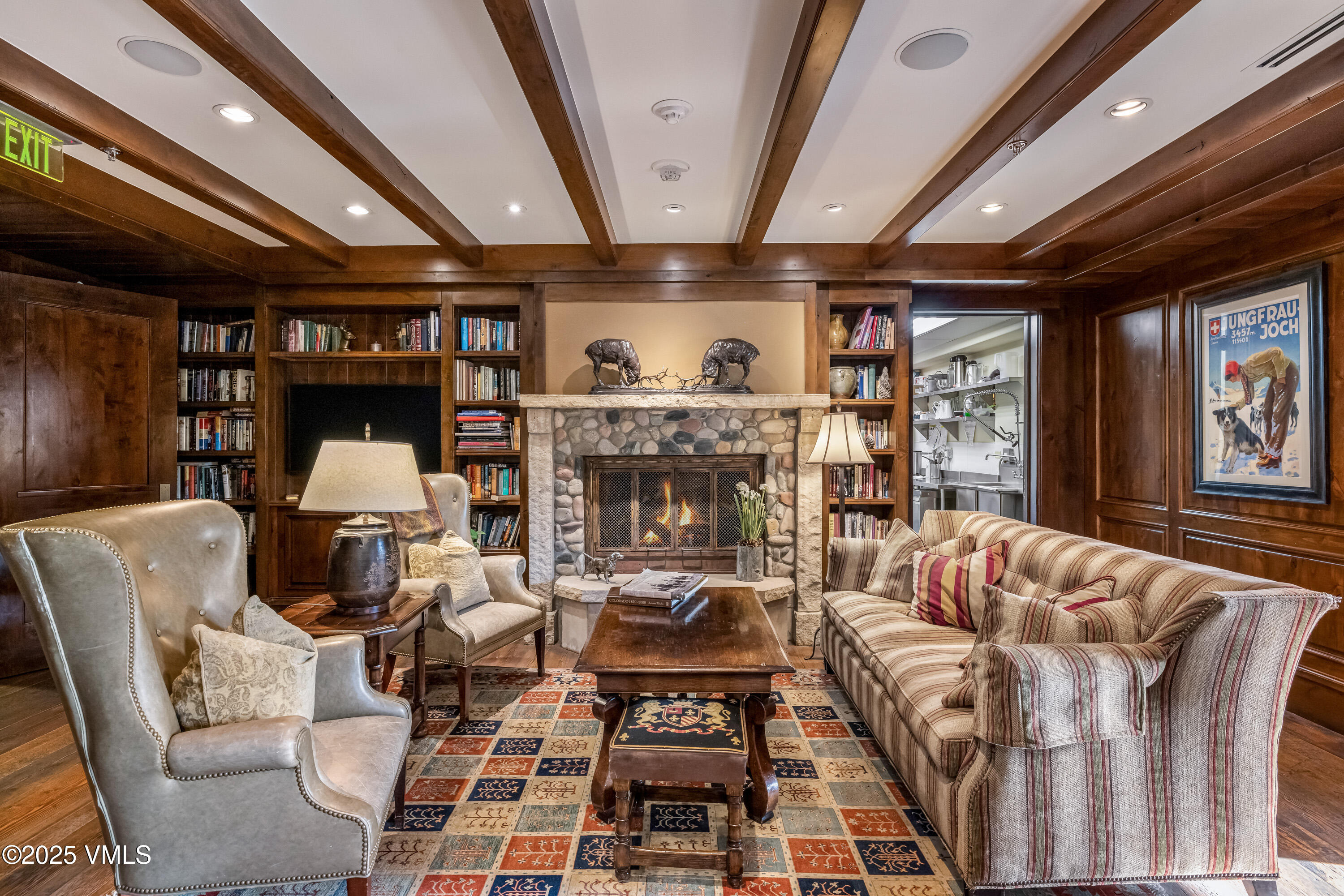 1 Willow Bridge Road, Unit 42 Vail, CO 81657 - Photo 67 of 72 a living room with furniture and a fireplace