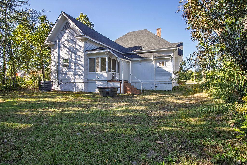 65 West Calhoun Street Wadley, GA 30477 - Photo 18 of 25 a view of a house with a yard