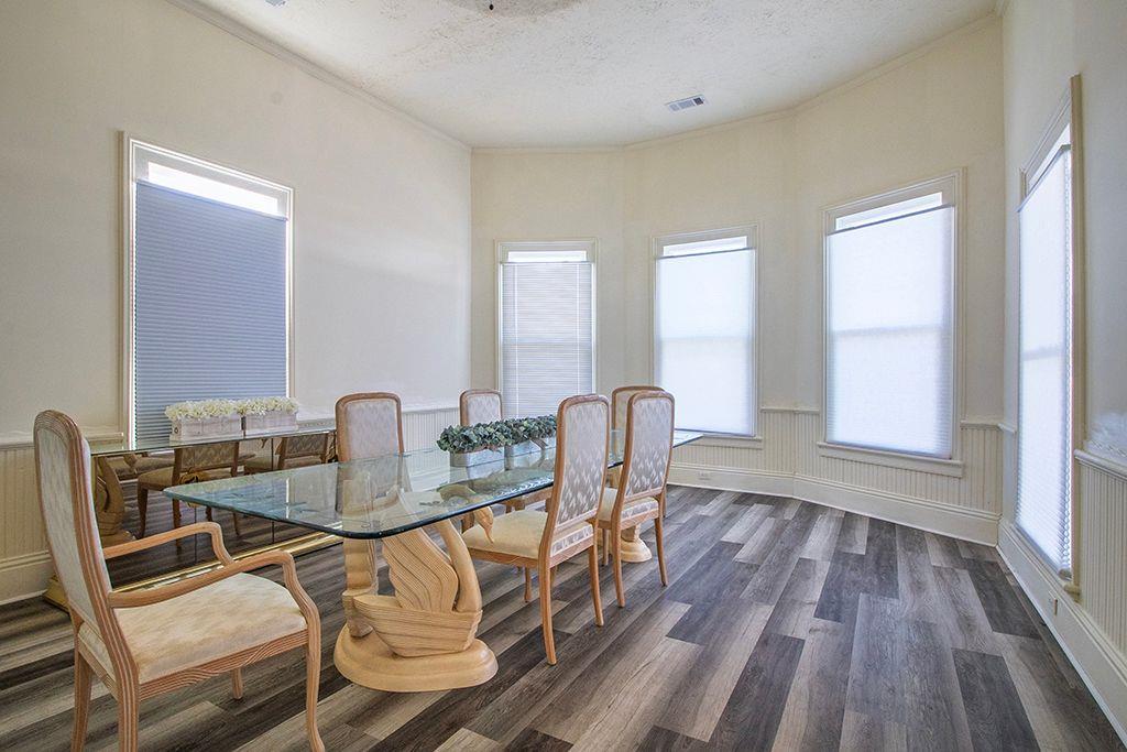 65 West Calhoun Street Wadley, GA 30477 - Photo 9 of 25 a dining room with furniture and wooden floor