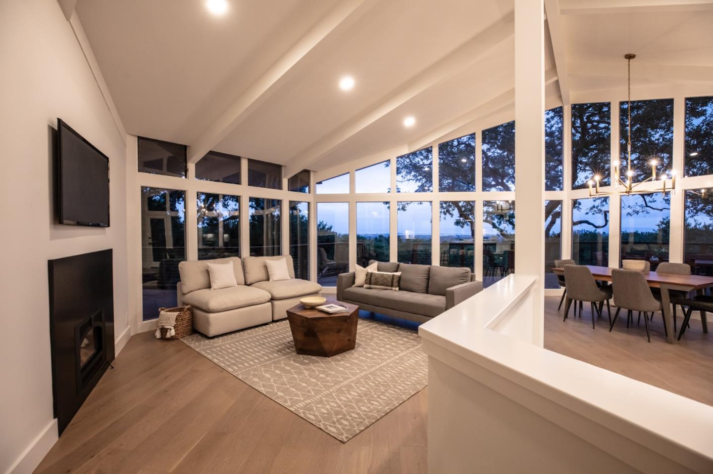 250 Hardwick Road Woodside, CA 94062 - Photo 11 of 65 a living room with fireplace furniture and a flat screen tv