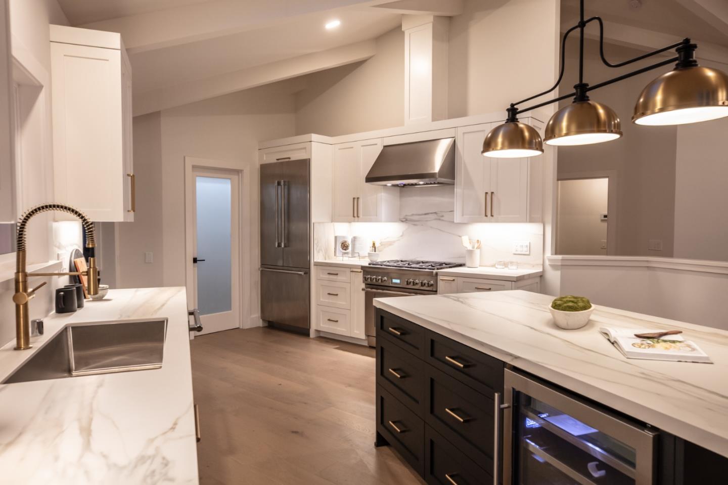 250 Hardwick Road Woodside, CA 94062 - Photo 18 of 65 a kitchen with a sink appliances and cabinets
