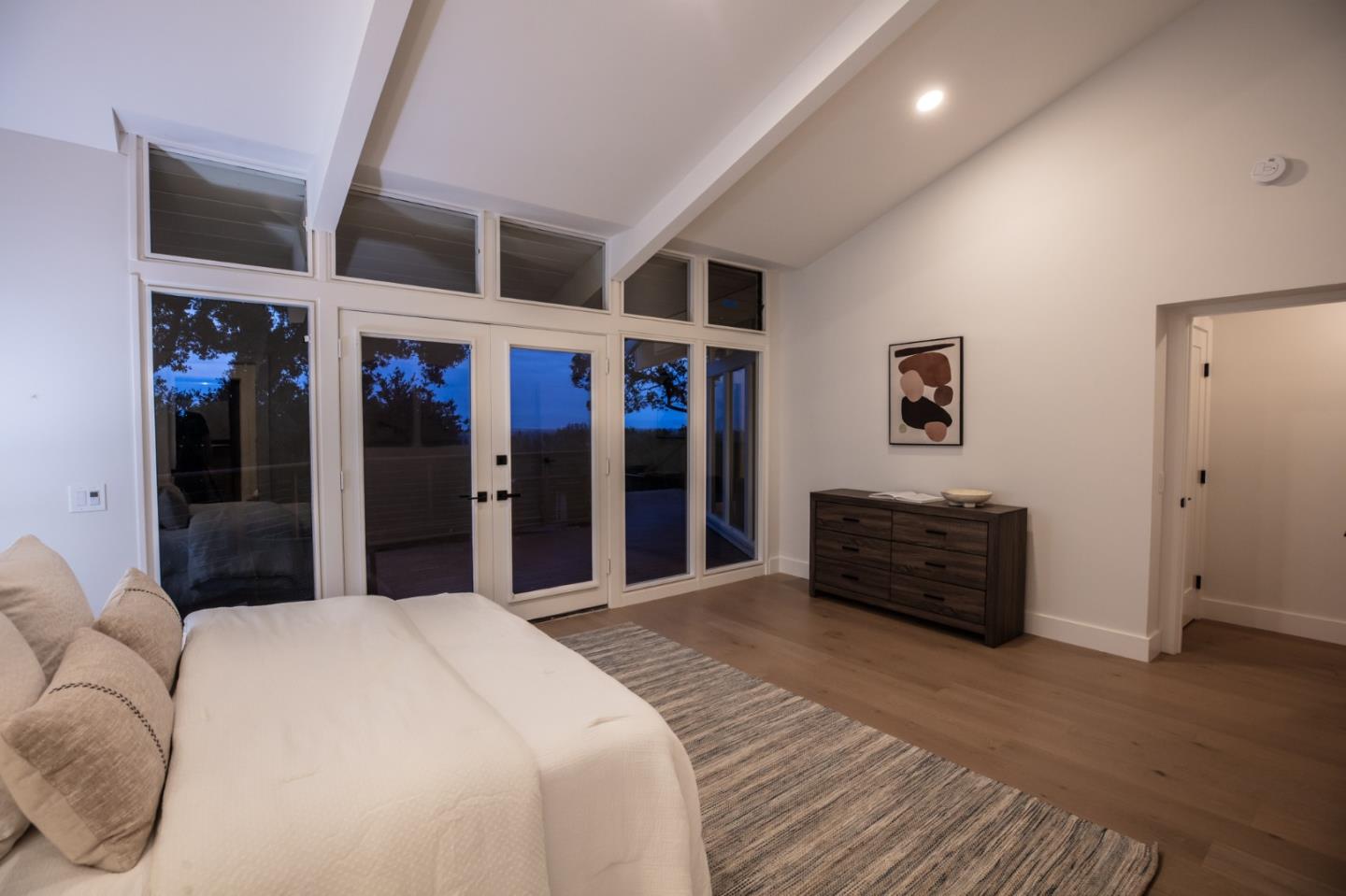 250 Hardwick Road Woodside, CA 94062 - Photo 37 of 65 a bedroom with a bed and a mirror