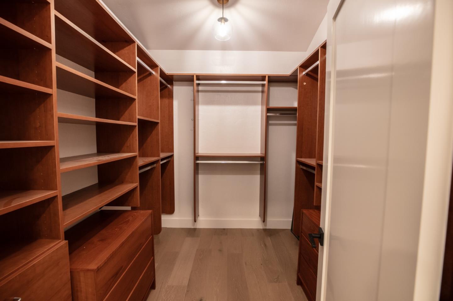 250 Hardwick Road Woodside, CA 94062 - Photo 38 of 65 a view of walk in closet with empty racks
