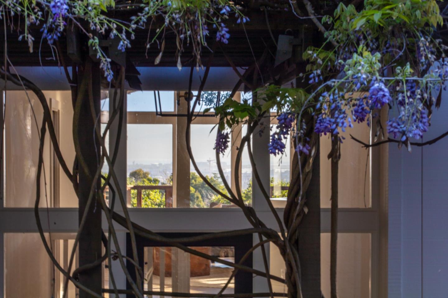 250 Hardwick Road Woodside, CA 94062 - Photo 7 of 65 a view of a house with a tree in front