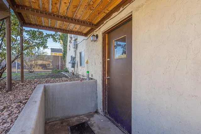 a kitchen with a sink and a refrigerator