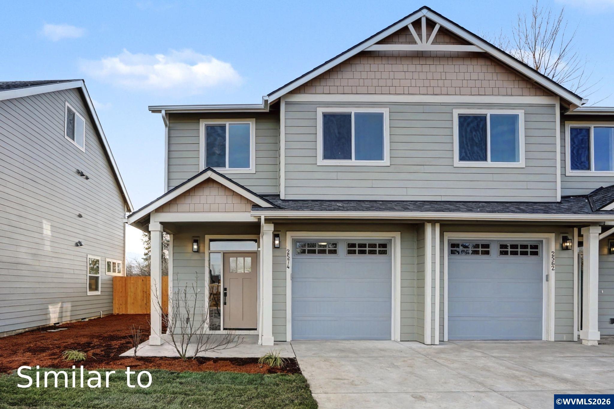 2550 Promise Way Lebanon, OR 97355 - Photo 1 of 35 a front view of a house with garden
