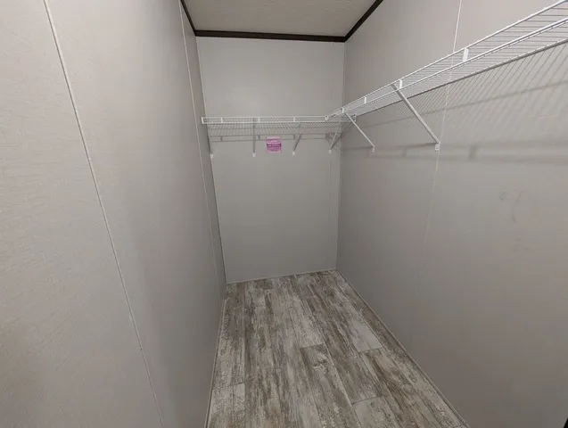 a view of a room with racks on the wall