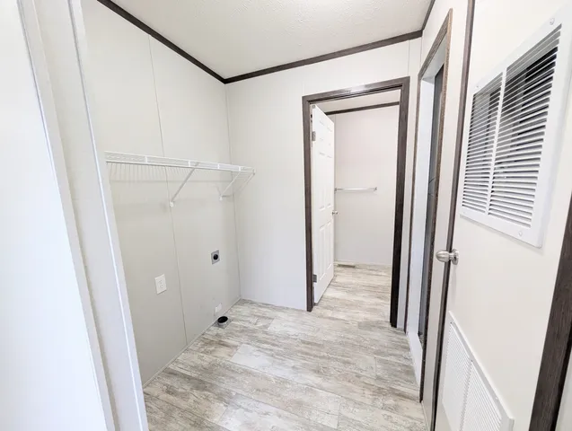 a view of entryway with wooden floor