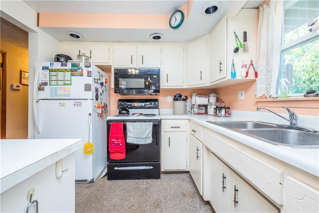 776 Mounts Road Washington, PA 15301 - Photo 11 of 40 a kitchen with refrigerator and window