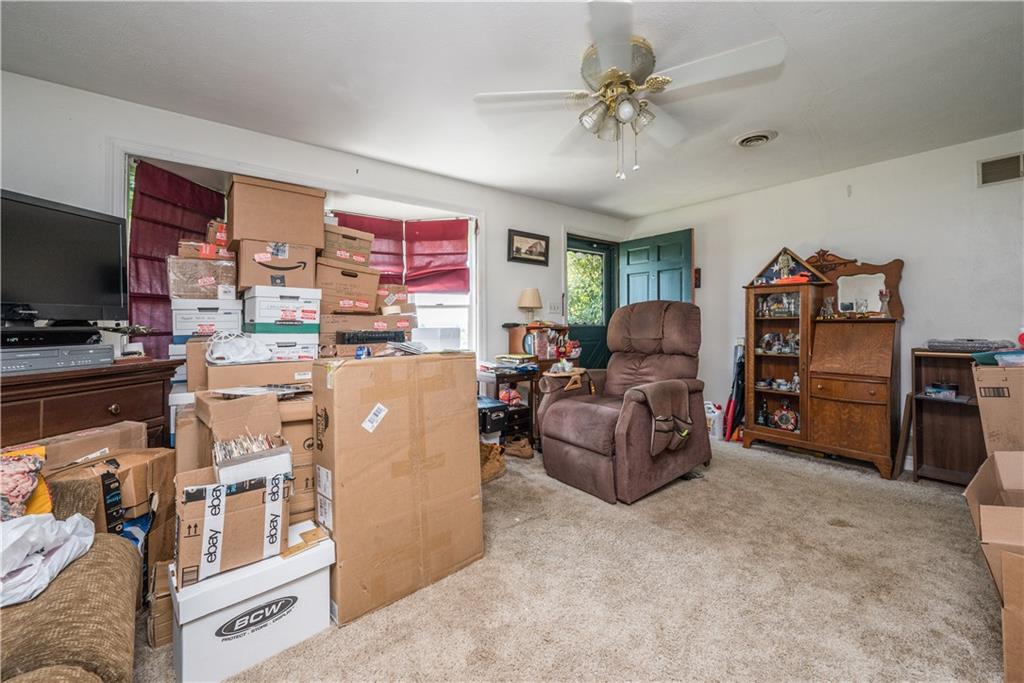 776 Mounts Road Washington, PA 15301 - Photo 7 of 40 a living room with furniture and a flat screen tv