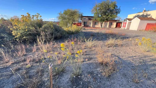 a view of swimming pool with a yard