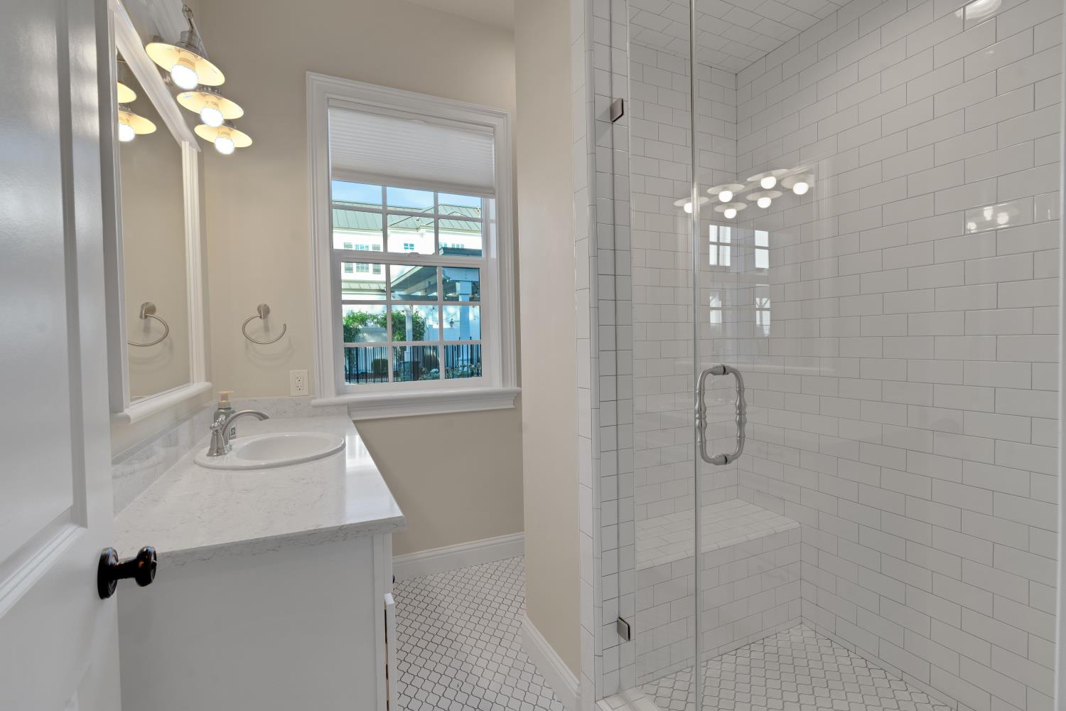 2905 Virginiatown Road Lincoln, CA 95648 - Photo 52 of 86 Pool House/ Gym Bathroom- Glass-enclosed shower with white subway tile surround and built-in bench