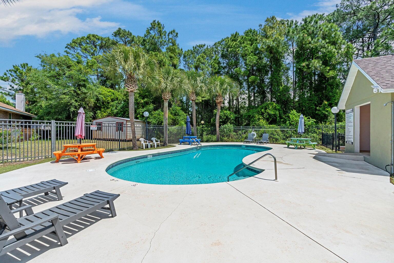4666 Sunsail Circle Destin, FL 32541 - Photo 11 of 41 a view of a swimming pool with a patio