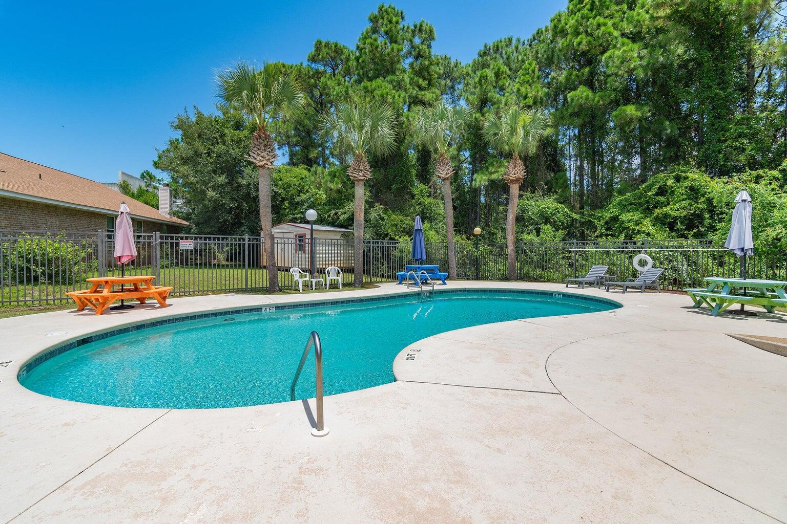 4666 Sunsail Circle Destin, FL 32541 - Photo 12 of 41 a view of a swimming pool with a patio