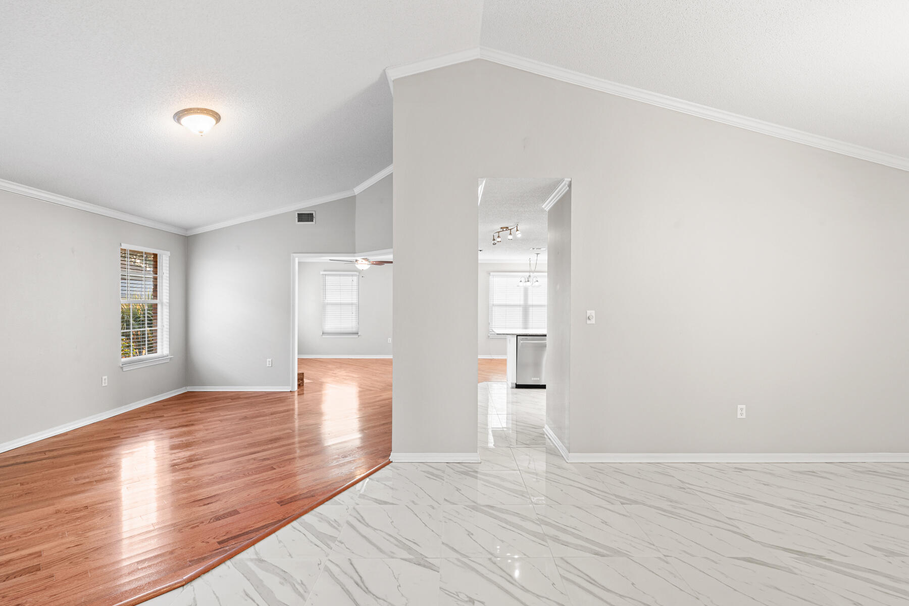4666 Sunsail Circle Destin, FL 32541 - Photo 15 of 41 a view of empty room with wooden floor and fan