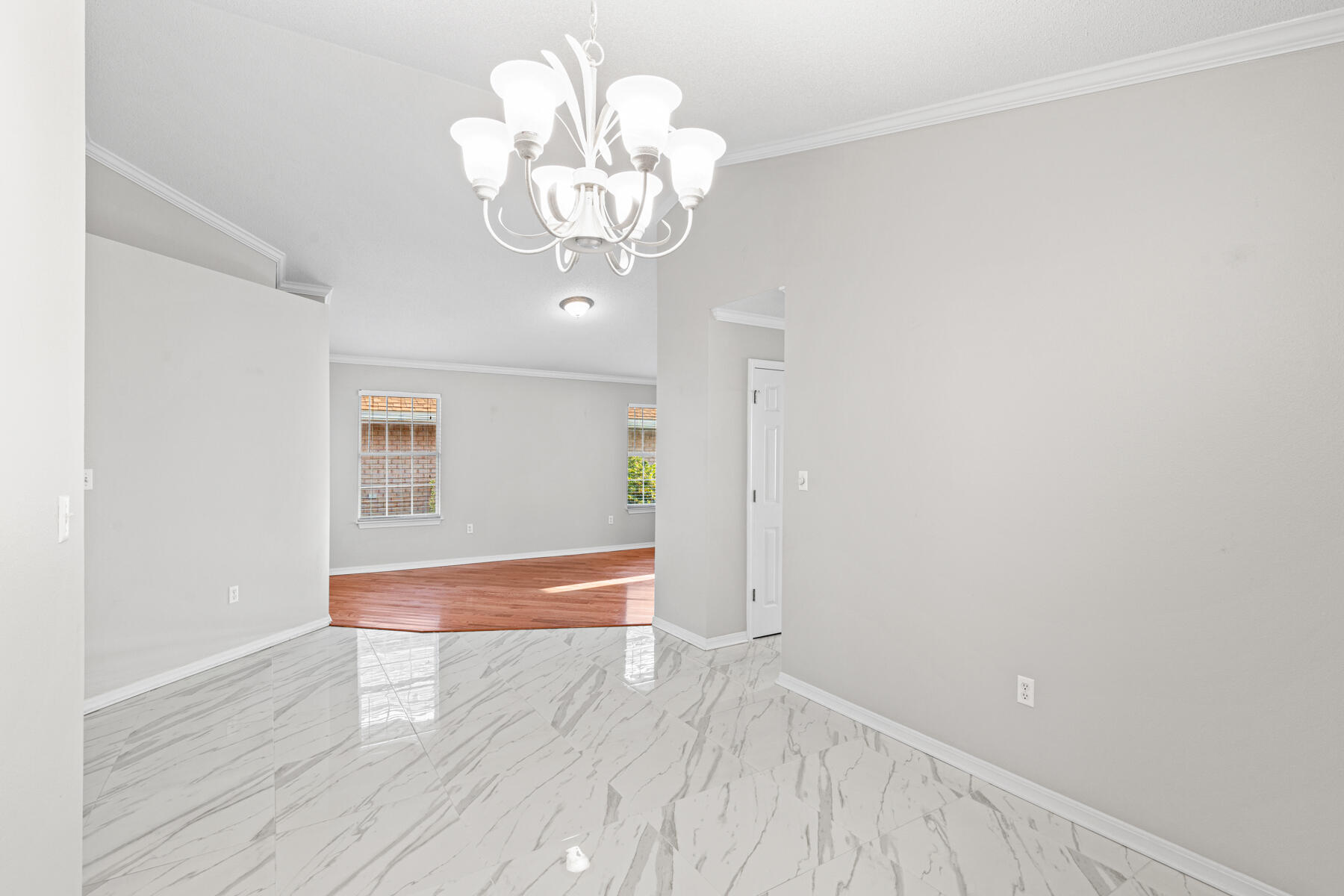 4666 Sunsail Circle Destin, FL 32541 - Photo 16 of 41 wooden floor in an empty room with a window