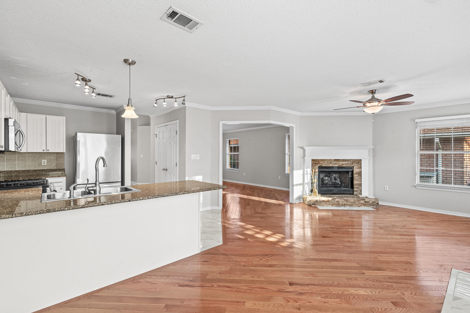 4666 Sunsail Circle Destin, FL 32541 - Photo 24 of 41 a large kitchen with kitchen island a sink stainless steel appliances and cabinets