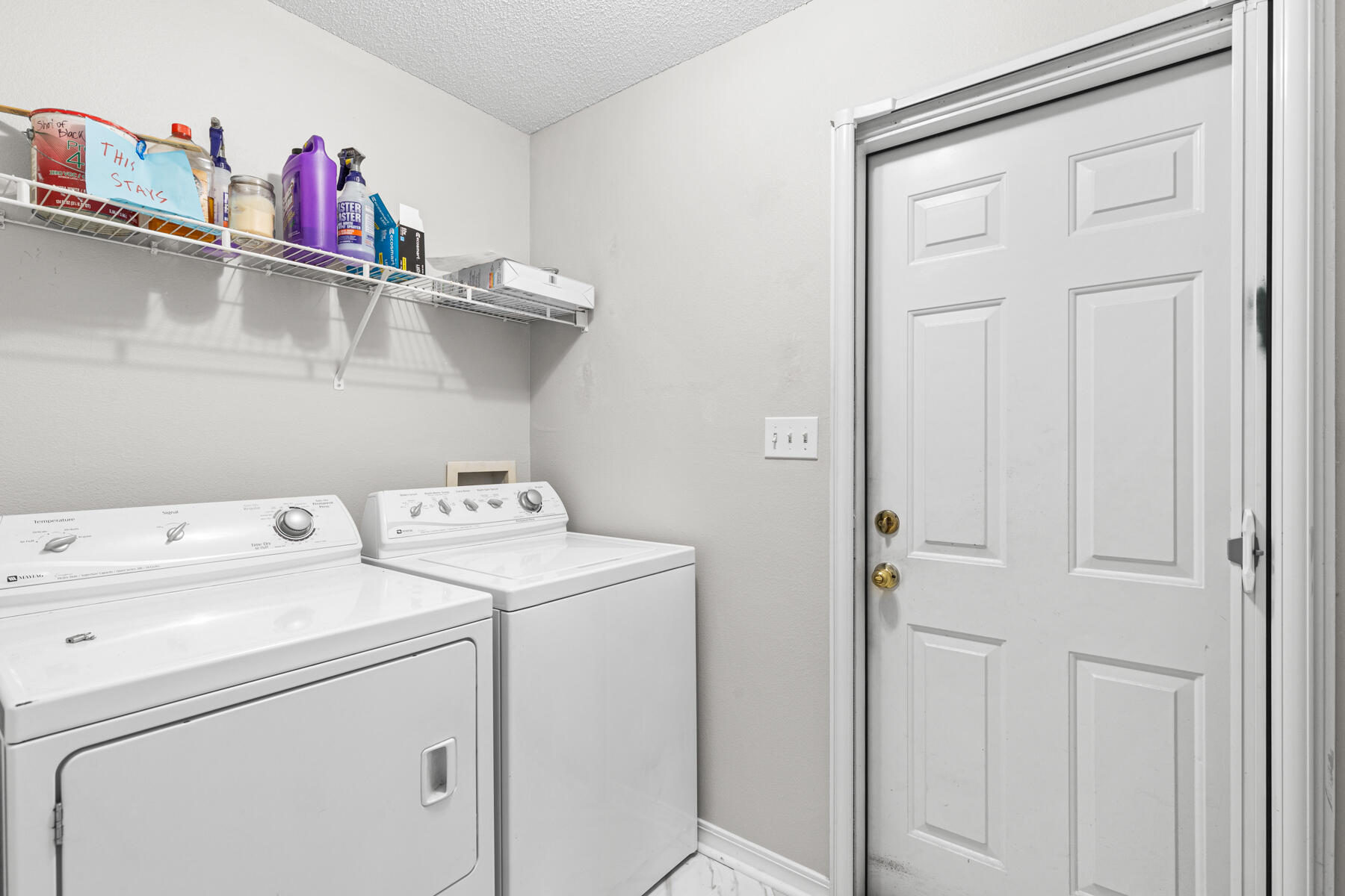 4666 Sunsail Circle Destin, FL 32541 - Photo 39 of 41 a view of storage and utility room with washer and dryer