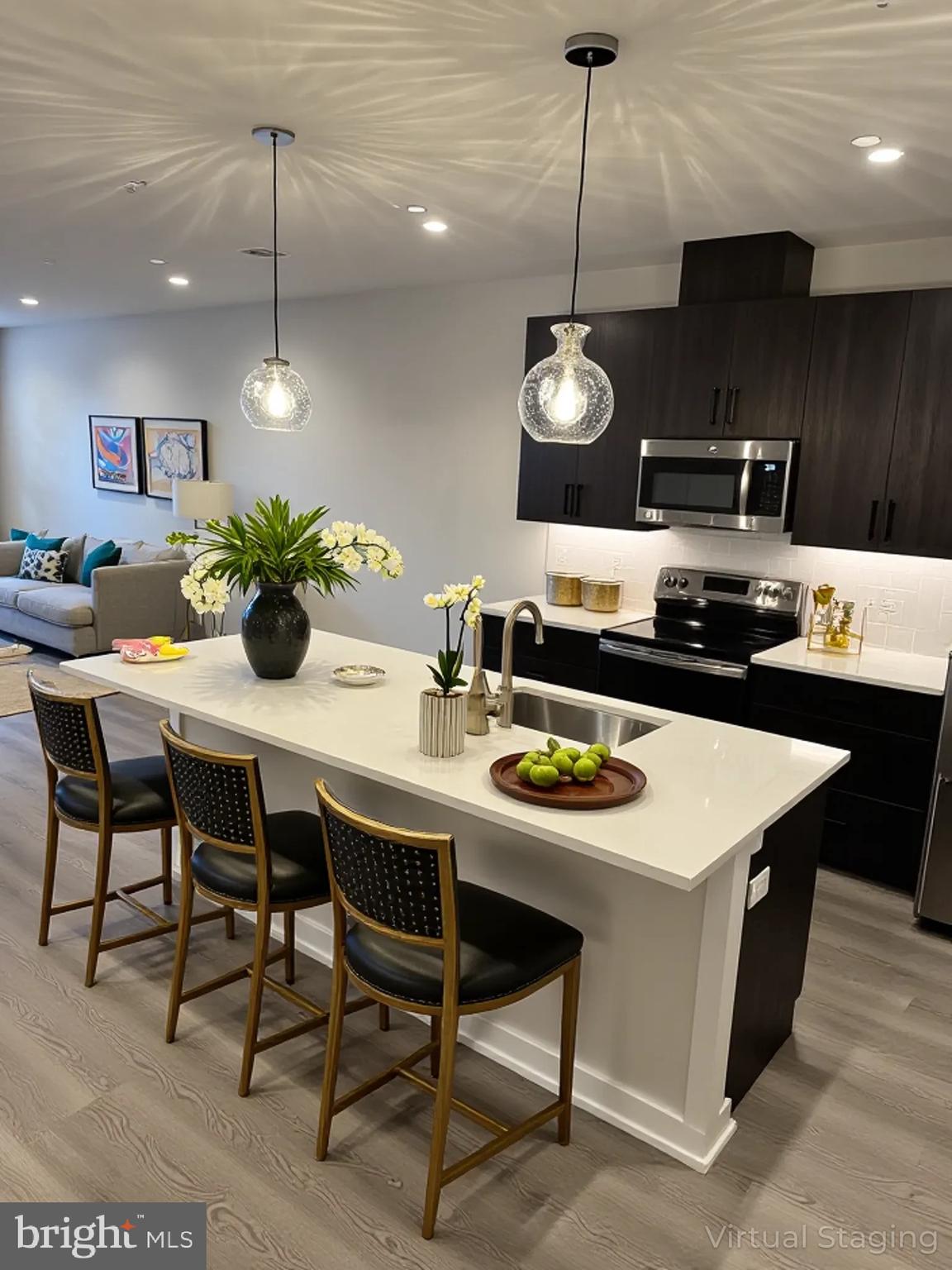 26 South York Road, Unit 104 Hatboro, PA 19040 - Photo 5 of 41 a kitchen with a dining table and chairs