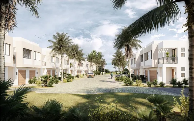 a view of a swimming pool with palm trees