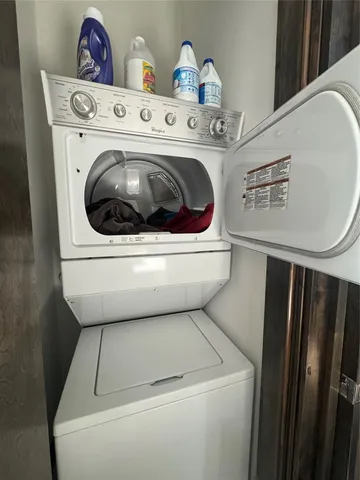 a view of balcony with wooden floor