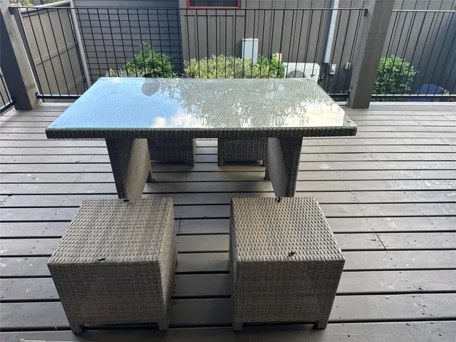 a kitchen with stainless steel appliances kitchen island a stove and a wooden floor