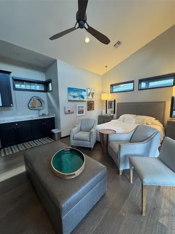 a kitchen with a sink and a stove top oven