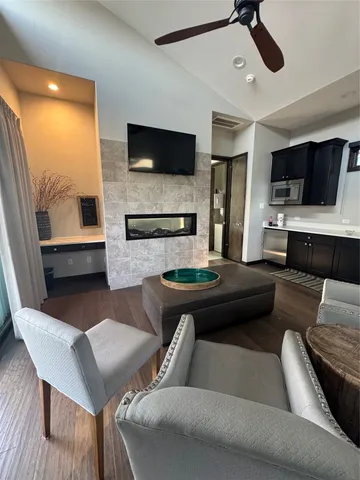 a view of barbeque area and seating area