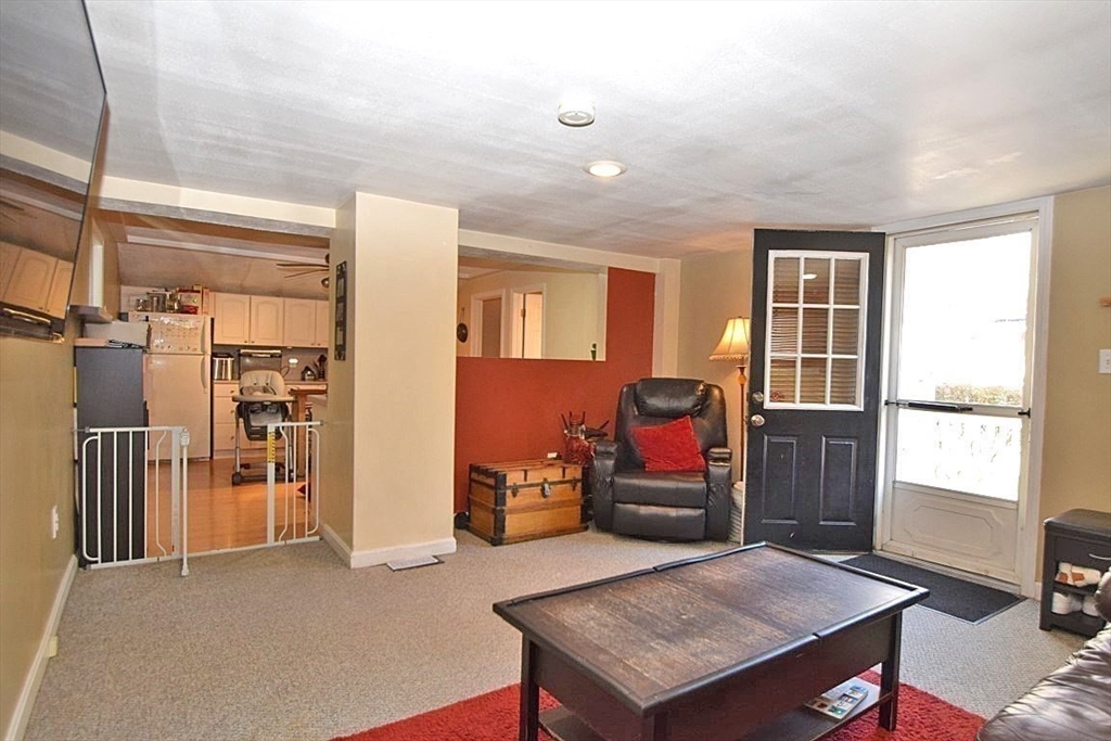 17 Kalmia Road Holbrook, MA 02343 - Photo 9 of 27 a living room with furniture and a window
