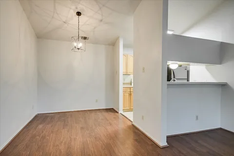 a kitchen with a stove and a sink