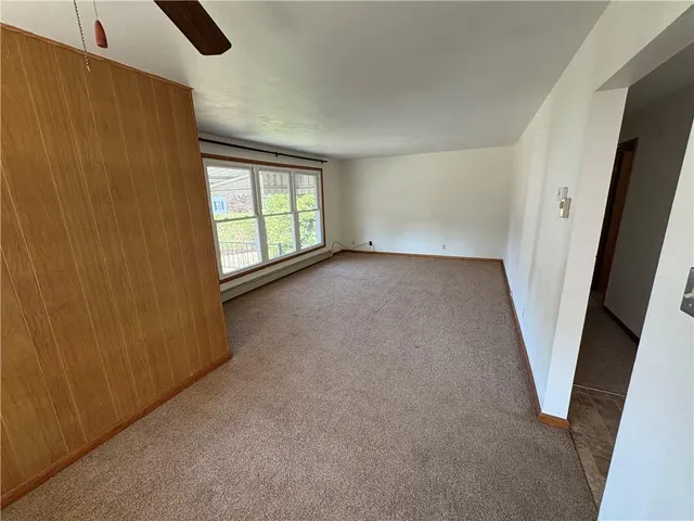 an empty room with windows