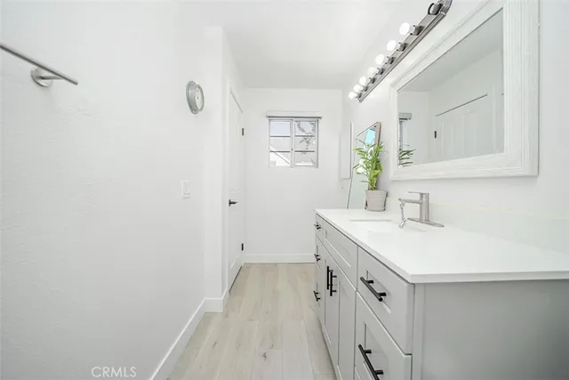 a spacious bedroom with a large bed and a couch