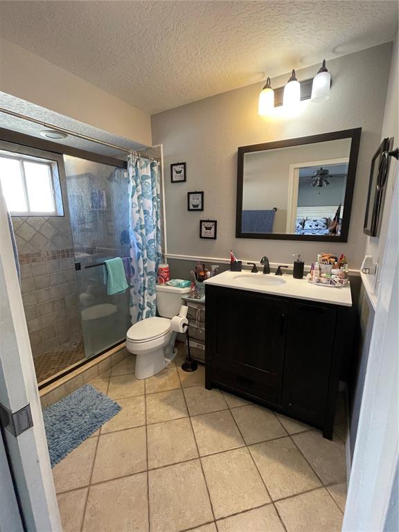 879 Little Bend Road Altamonte Springs, FL 32714 - Photo 14 of 23 a room with a baby crib and a mirror