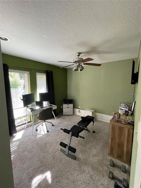 879 Little Bend Road Altamonte Springs, FL 32714 - Photo 17 of 23 a workspace with furniture and window