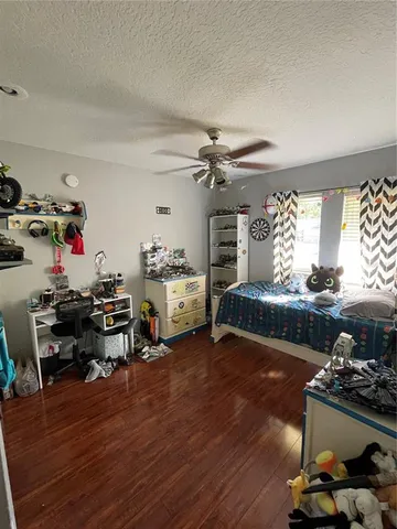 a view of a workspace with furniture and a livingroom
