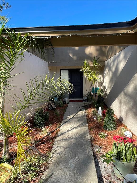879 Little Bend Road Altamonte Springs, FL 32714 - Photo 2 of 23 a front view of a house with a yard