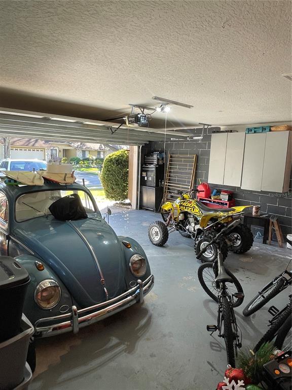 879 Little Bend Road Altamonte Springs, FL 32714 - Photo 21 of 23 a room with gym equipment and a mirror