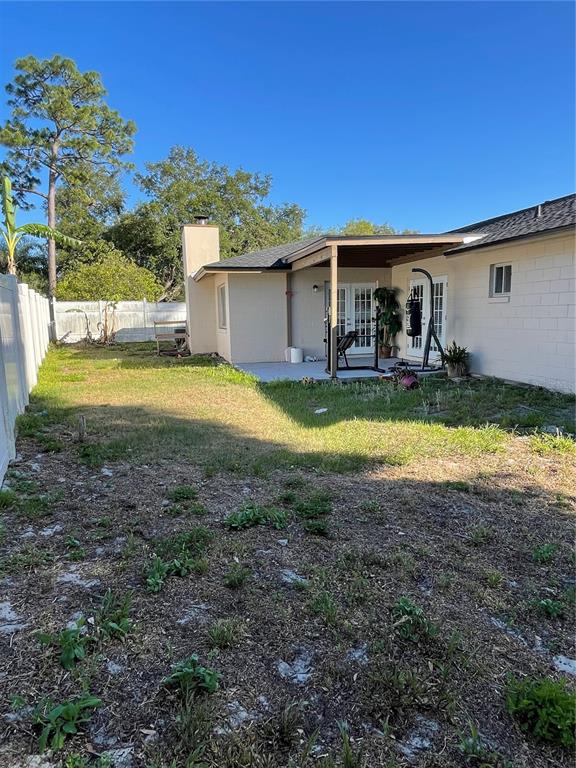 879 Little Bend Road Altamonte Springs, FL 32714 - Photo 23 of 23 a view of a house with backyard and swimming pool