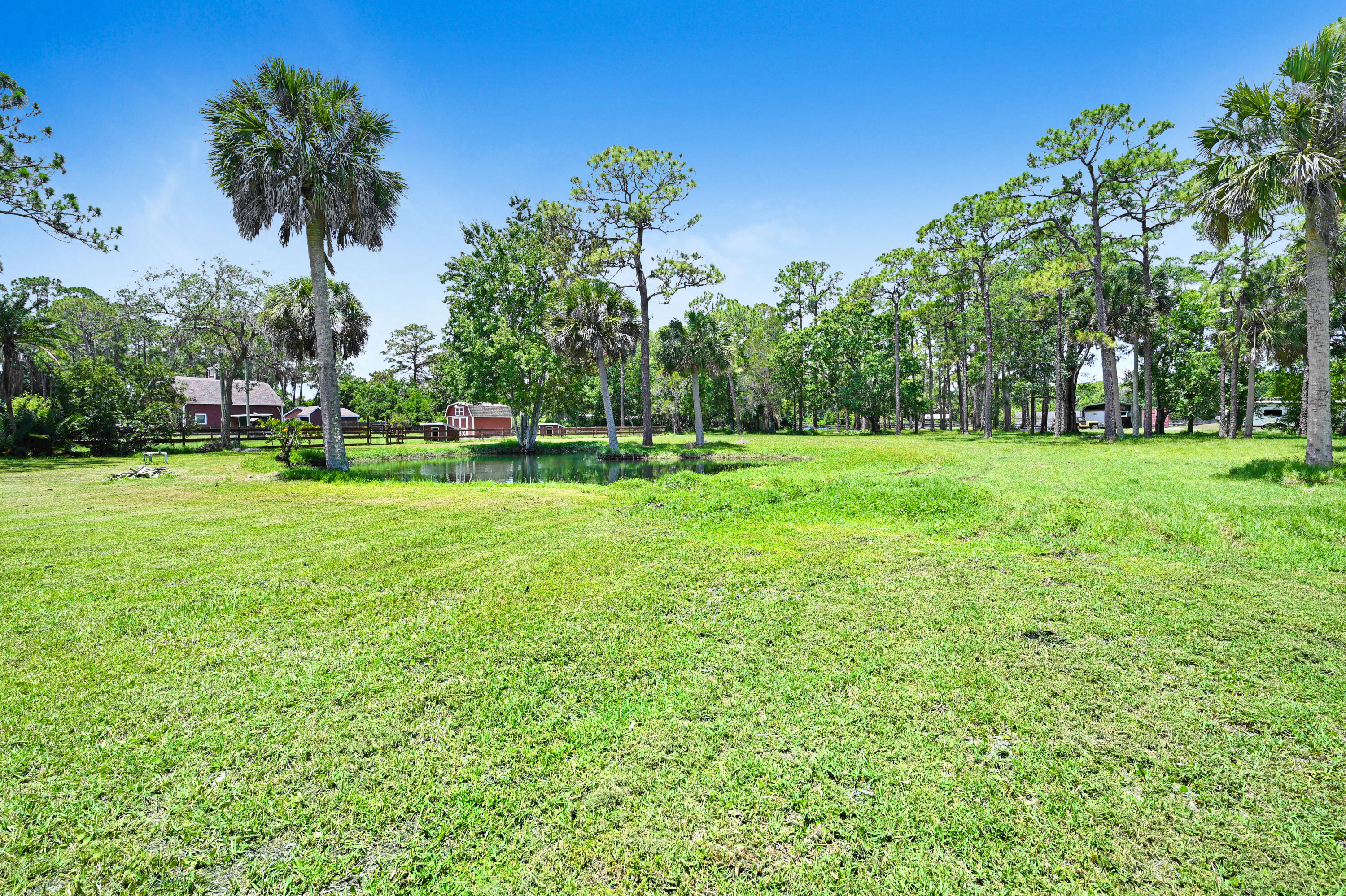 2340 Turtle Mound Road Melbourne, FL 32934 - Photo 23 of 30 a view of a big yard with a palm trees