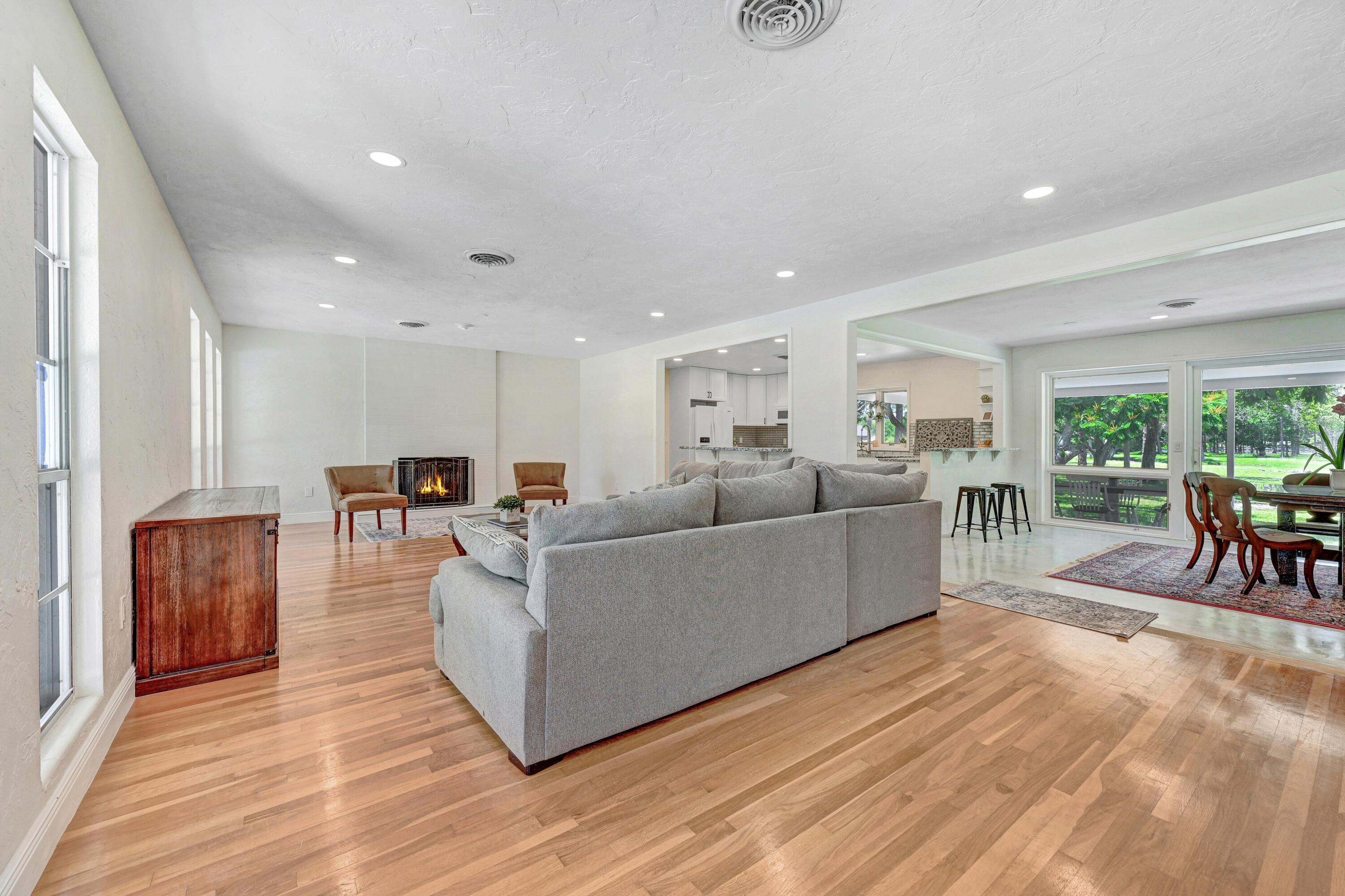2340 Turtle Mound Road Melbourne, FL 32934 - Photo 5 of 30 a living room with furniture and a wooden floor