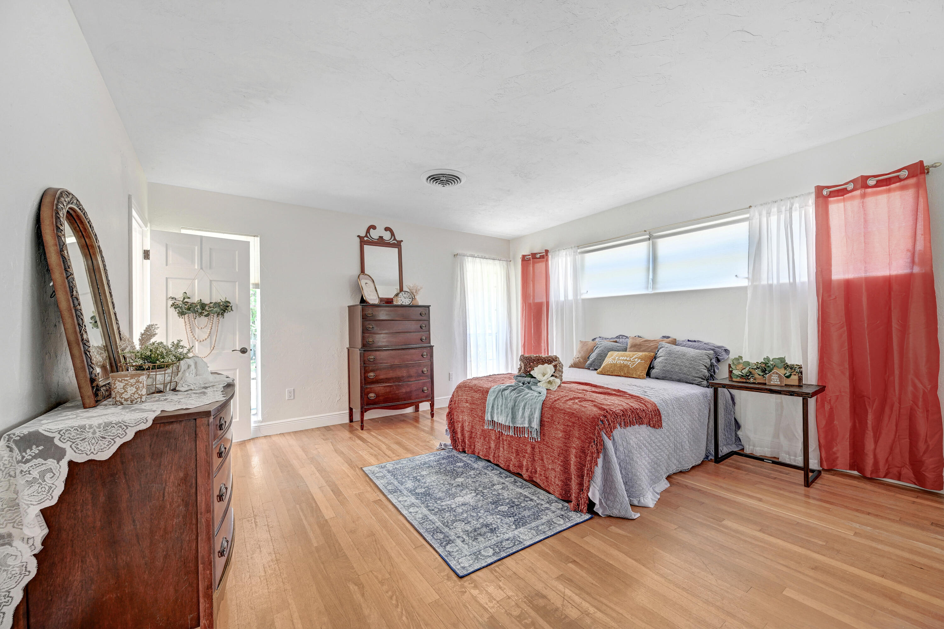 2340 Turtle Mound Road Melbourne, FL 32934 - Photo 9 of 30 a bedroom with a bed and a dresser