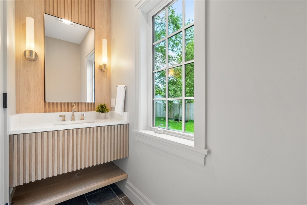 28 Parker Road Wellesley, MA 02482 - Photo 15 of 32 a view of a bathroom with a tub and sink