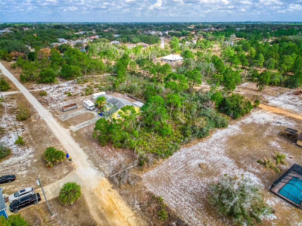 3085 West Scoralick Road Avon Park, FL 33825 - Photo 8 of 16 a view of a garden with an outdoor space