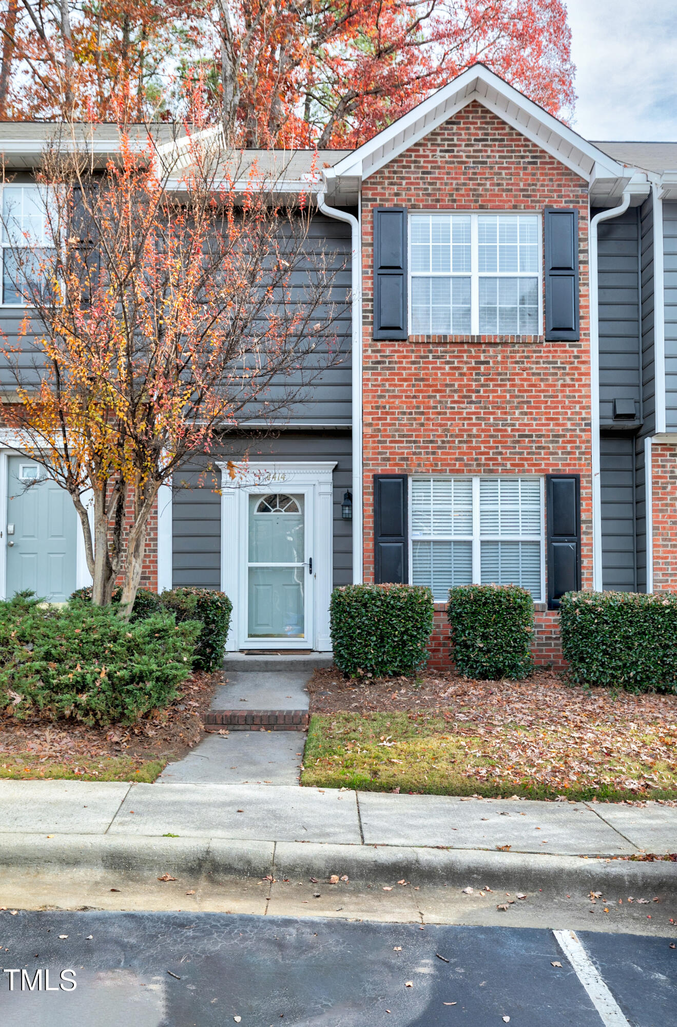 4414 Still Pines Drive Raleigh, NC 27613 - Photo 36 of 36 a front view of a house with a yard