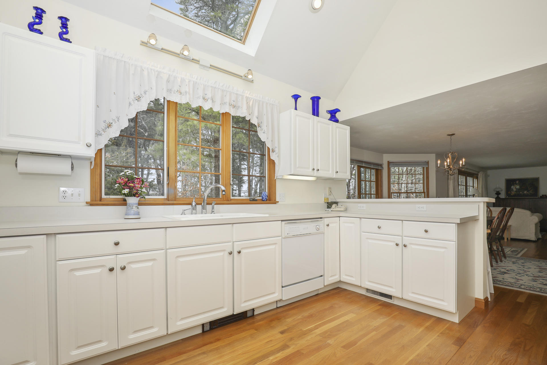 8 Clark's Point Road Eastham, MA 02642 - Photo 11 of 35 a spacious bathroom with a granite countertop double vanity and a large window